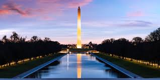 The Washington Monument at sunset, reflected in the Reflecting Pool on the National Mall